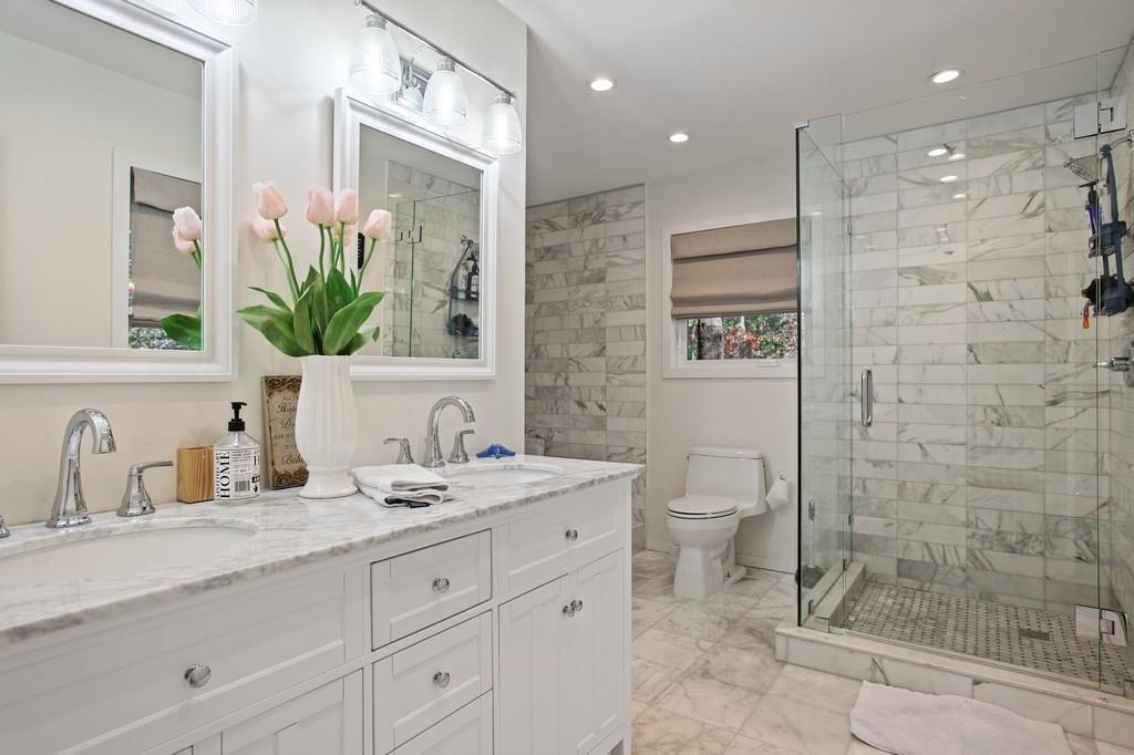 Luxury marble master bathroom renovation Long Island — walk-in shower, double vanity
