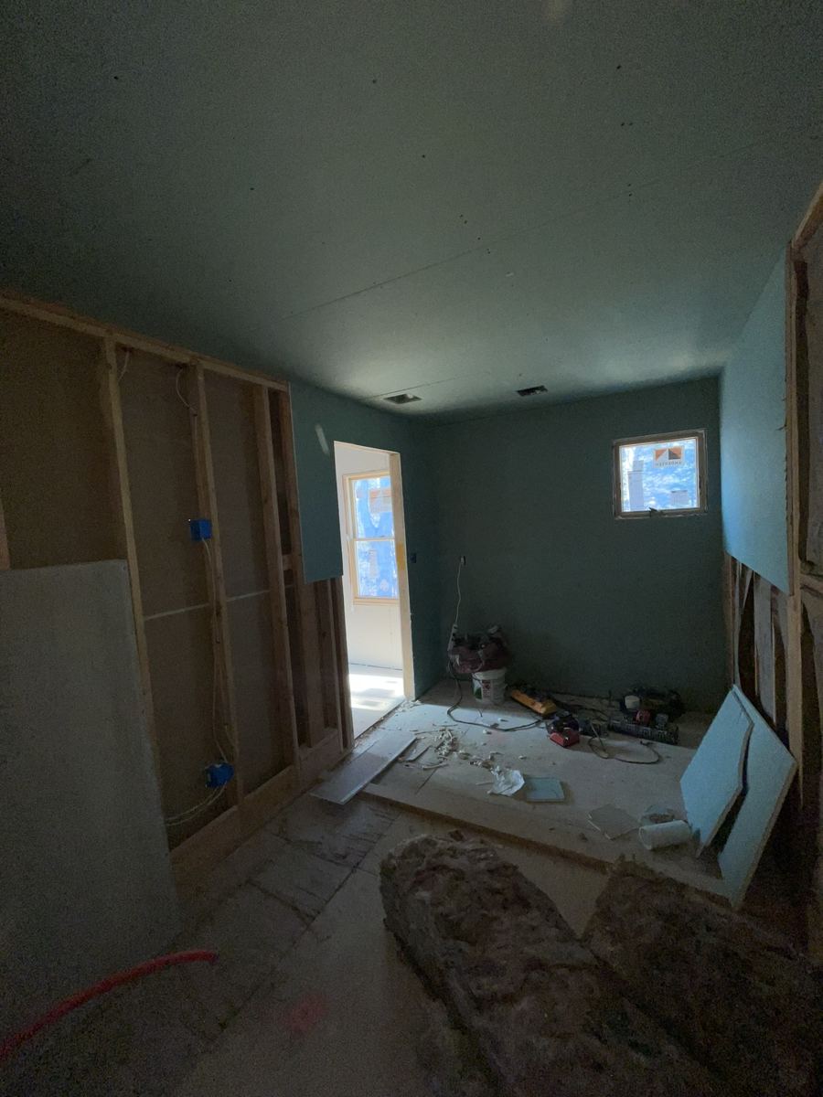 Interior rebuild with new framing and moisture-resistant drywall