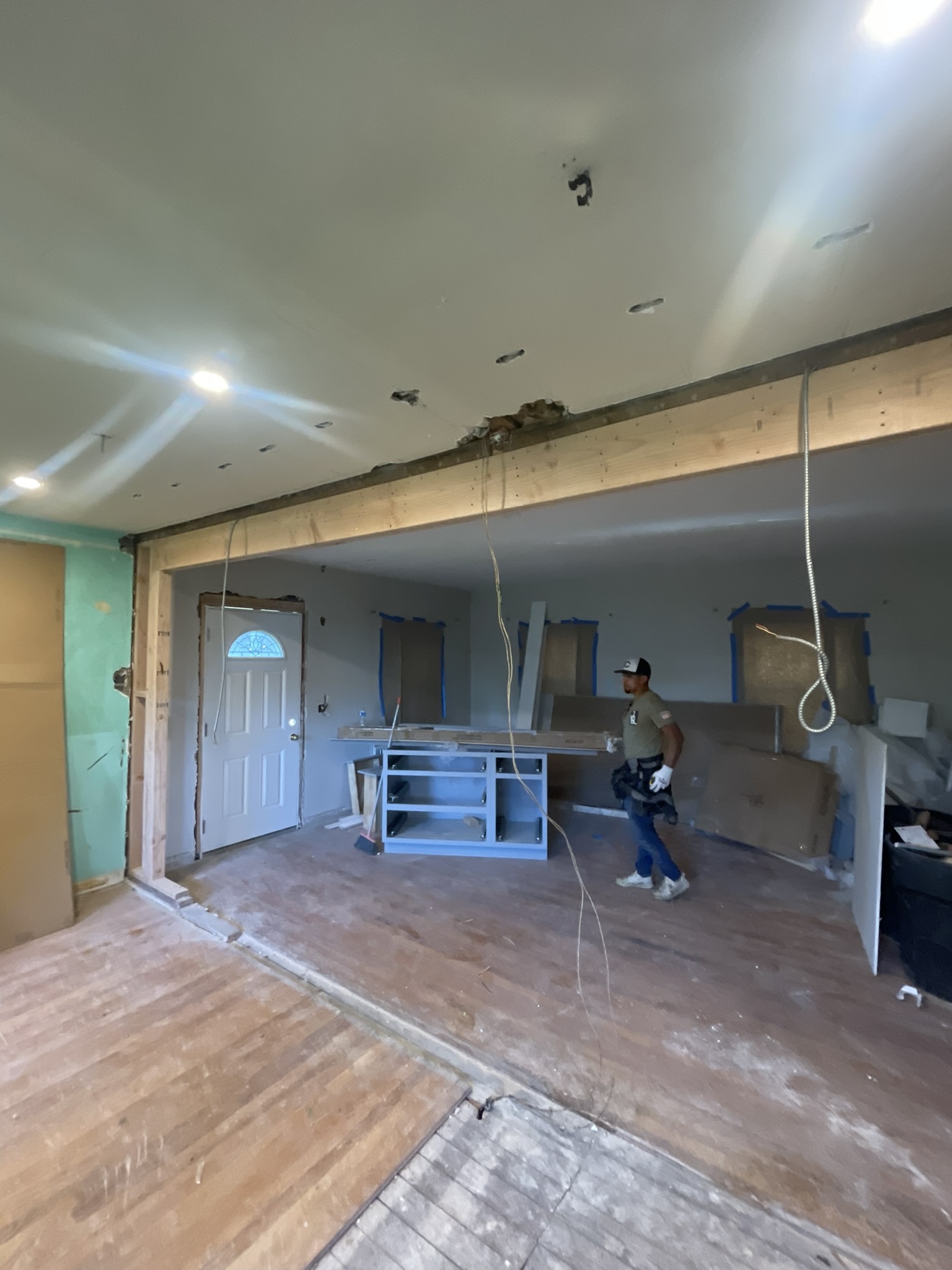 Kitchen renovation progress — beam installation Long Island
